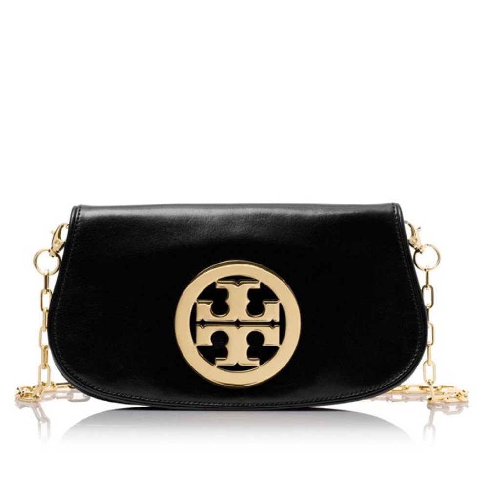 Tory Burch clutch. Great condition, leather has no damage. In original dust bag
